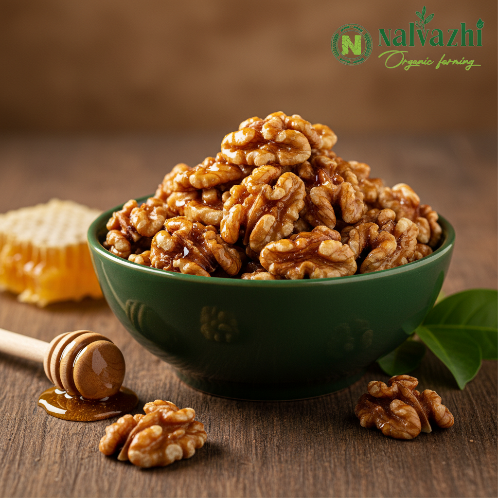 Golden honey-roasted walnuts with honey dipper and Nalvazhi Organic Farming logo
