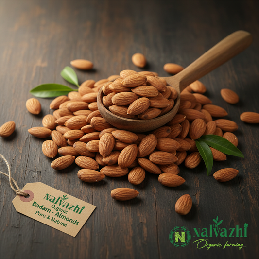 Nalvazhi Organic Badam whole almonds on dark wooden surface with wooden spoon
