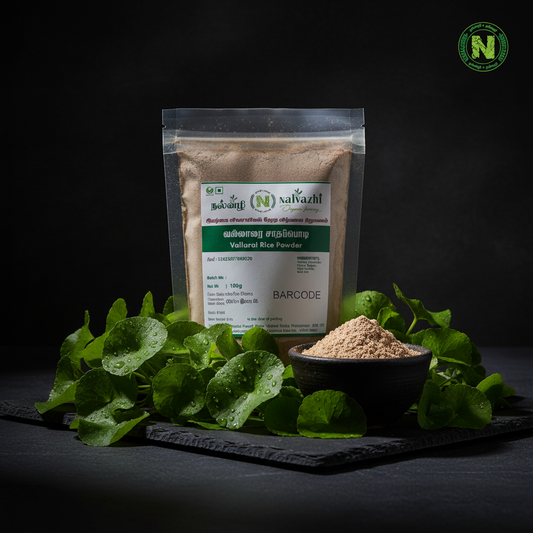 Nalvazhi Vallarai Satha Podi packet on dark slate with dramatic lighting and fresh vallarai leaves