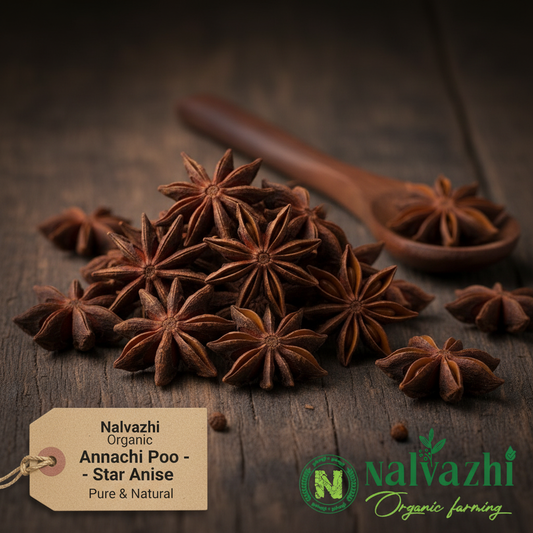 Nalvazhi Organic Annachi Poo whole star anise dark reddish-brown on dark wooden surface
