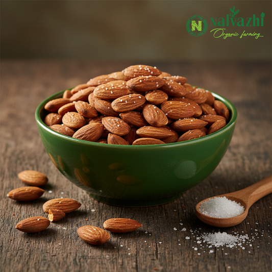 Golden roasted and lightly salted almonds with Nalvazhi Organic Farming logo