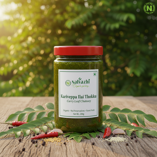 Nalvazhi Kariveppa Ilai Thokku jar with fresh curry leaves and Nalvazhi label