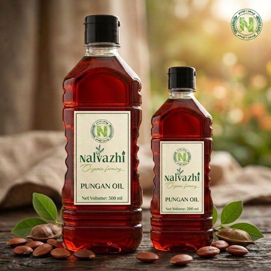 Nalvazhi Pungan Oil 500 ml and 200 ml bottles with Pungan seeds, pods and green leaves