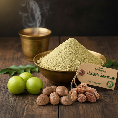 Thiripala Sooranam powder in brass uruli with all three fruits - Nellikkai, Kadukkai and Thanrikkai